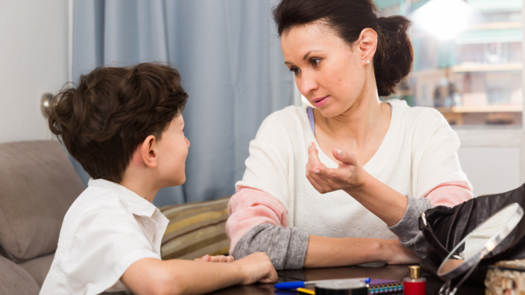 mother having a serious conversation with her son at home